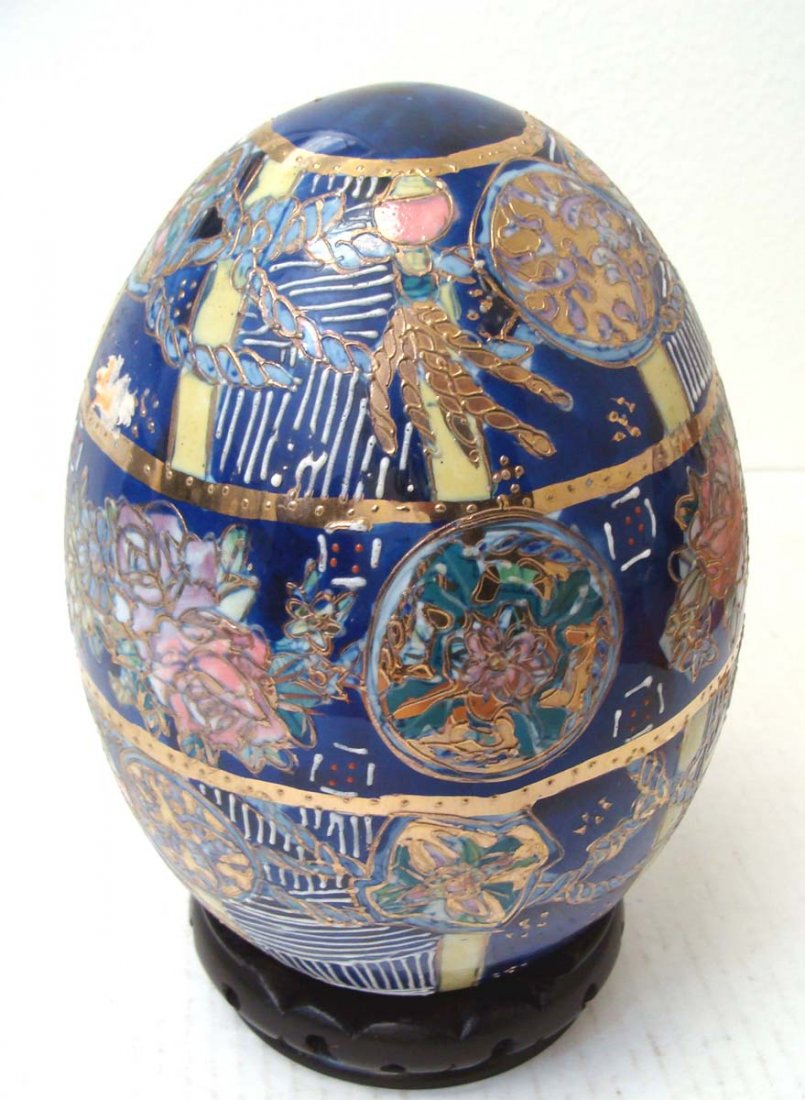 Chinese Blue Gold Porcelain Enameled Egg Floral Design: NO RESERVE! Decorated with raised enamel colors all around the egg, dimensions 8" tall + wood base