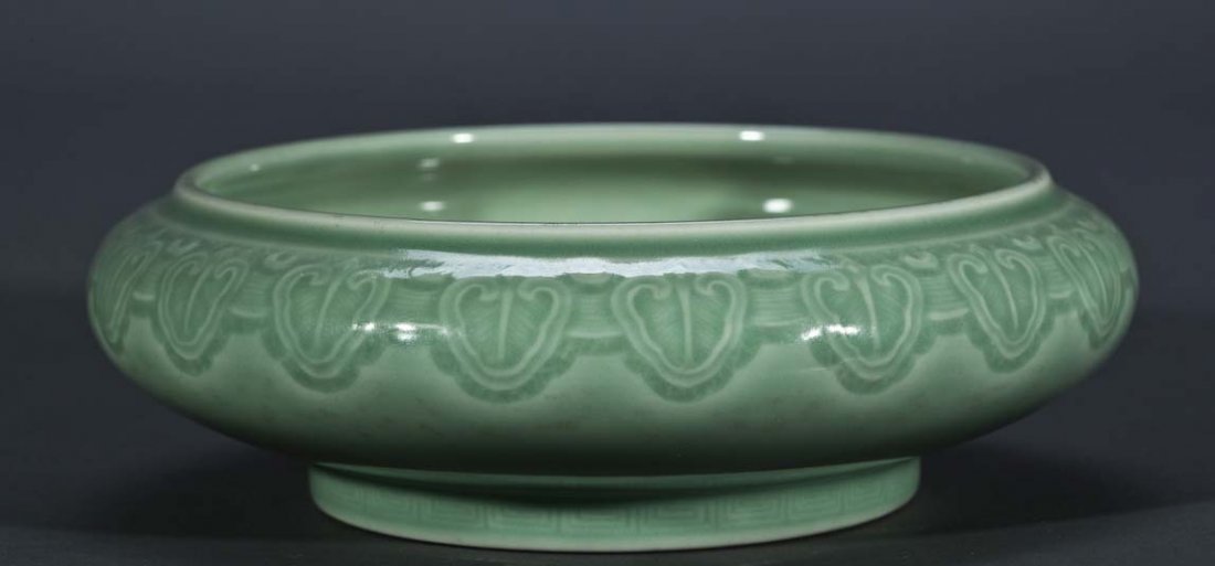 Chinese Celadon Glazed Porcelain Brush Washer Bowl: Celadon Glazed, supported on a shallow tapering foot, with a stylized ruyi head around the body above a key fret design around the base. Diameter 7" by 2.25" tall LB017