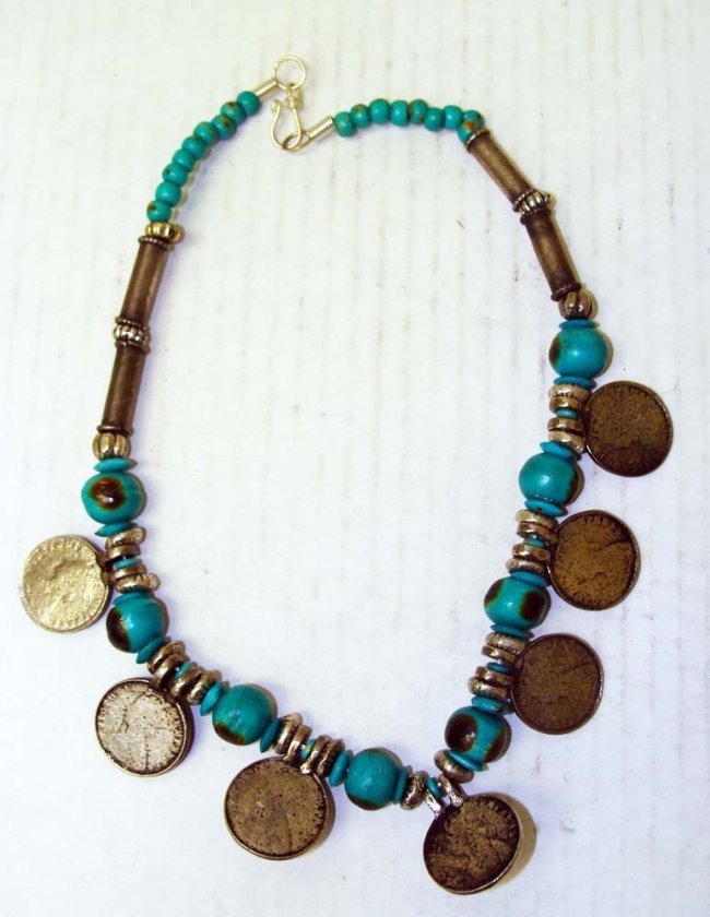 Nepal Necklace & Pendant Turquoise & Coins: Seven old coins adorn a turquoise beaded necklace with nickel silver, Dimensions: 18" long K4W5