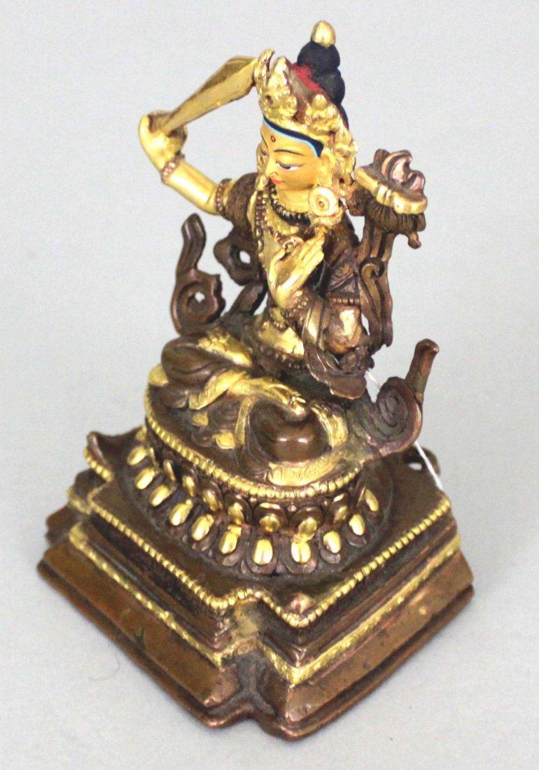Nepal Tibetan Goddess with Sword: On a lotus throne, holding a sword, brass, copper, silver and gold plate, 5" tall K2W75