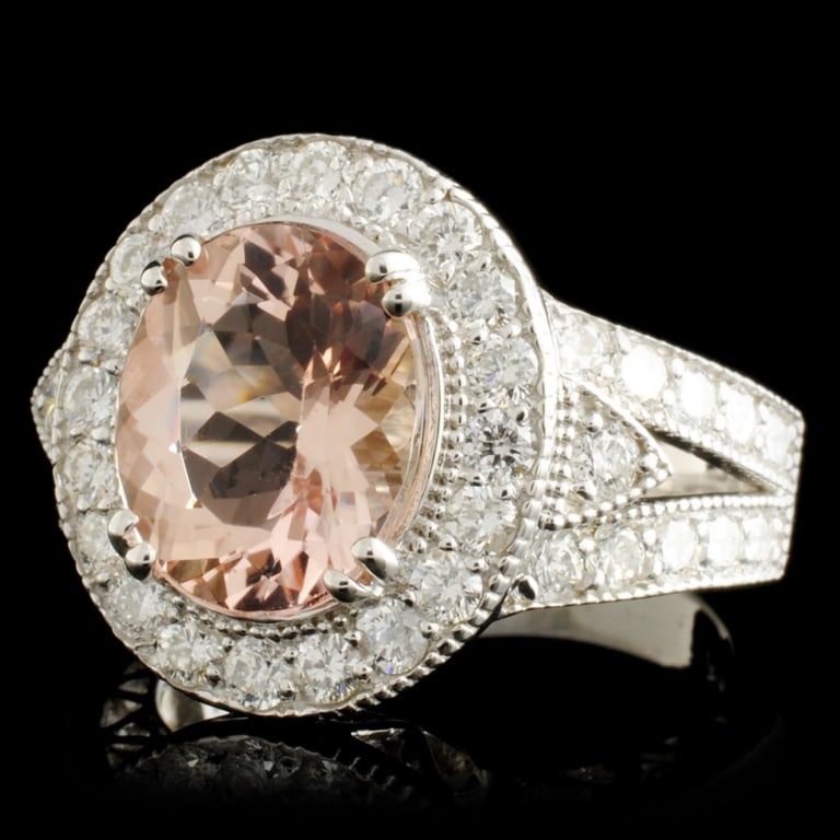5ct Morganite & 1.40ctw Diamond Ring, 14K Gold: Estimated Retail Replacement Value: $11,550.00Ref: WAG6600Item no.: LAI030016014-00420/R5-00MSpecification:Gold Content: Solid 14K White GoldWeight of Item: 8.00 gramsSize: 8.25Country Made: U.S.AMain