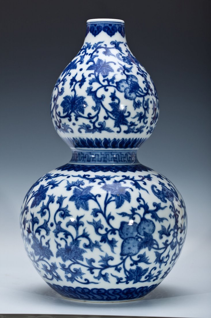 CHINESE ANTIQUE BLUE AND WHITE DOUBLE GOURD VASE: DEPICTING PEACHES AND BATS. SIX CHARACTER MARKED. Dims 12" H X 7" Diameter, DB517
