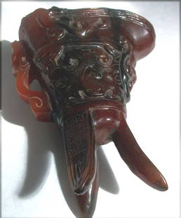 Chinese Antique Rhinoceros Horn Libation Cup: With a Tripod Base, finely carved with characters on legs, Circa 18th century, 4" tall by 2 1/2" wide, BK248