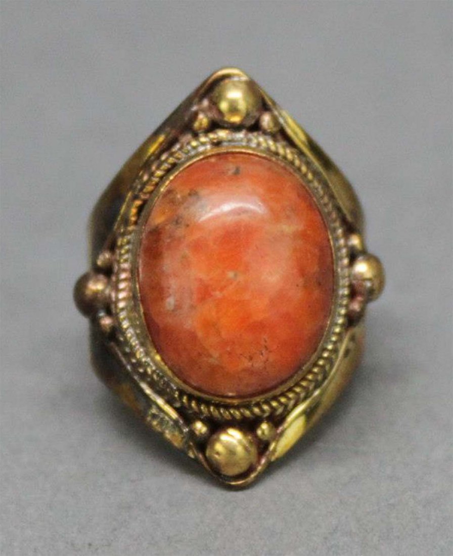 Tibetan Nepal Handcrafted Coral Cabachon Ring: Nepal Nickel silver (gold plated) with coral cabachon inset, ring size 9