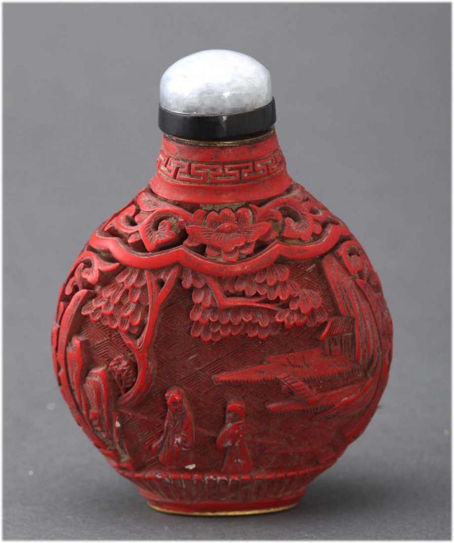 Chinese antique carved cinnabar snuff bottle: Depicting figures and landscapes. Early 20th C. dimensions: 2.5" H K093W