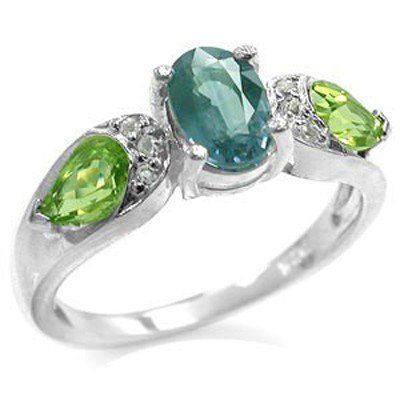 Alexandrite Peridot & Topaz Sterling Ring Color Change: 1 oval shape alexandrite doublet (composite gem) and 2 pear shaped genuine peridot gems. Color Change: Good color change from green to purple. Alexandrite total carat weight: 1.25 ct. Peridot's total
