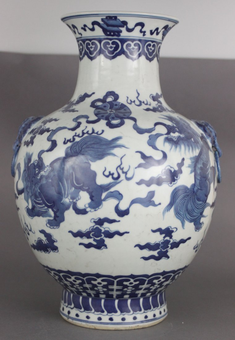 Chinese Porcelain Blue & White Fu Dogs with Bats Vase: dimensions: 14" tall by 8" diameter, LB104