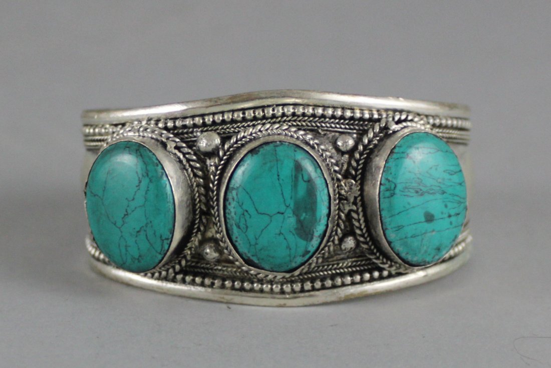 Nepal Silver & Turquoise Carved Bracelet: Dimensions: 2" - 3" Dia, JS20