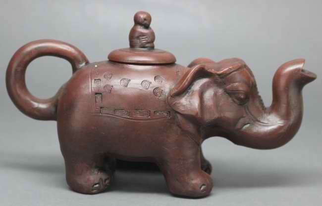 Chinese Porcelain Zisha Elephant Teapot: Dimensions: 5" H x 8.25" Dia, AF237 K12W0