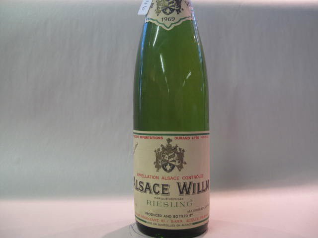 Alsace Willm Riesling 1969: This wine bottle will be sold in auction with S.A.Q.approbation. Note: All wine bottles value were upraised $100-$200, even if they are worth more or less. We all start them at $10, because these bott