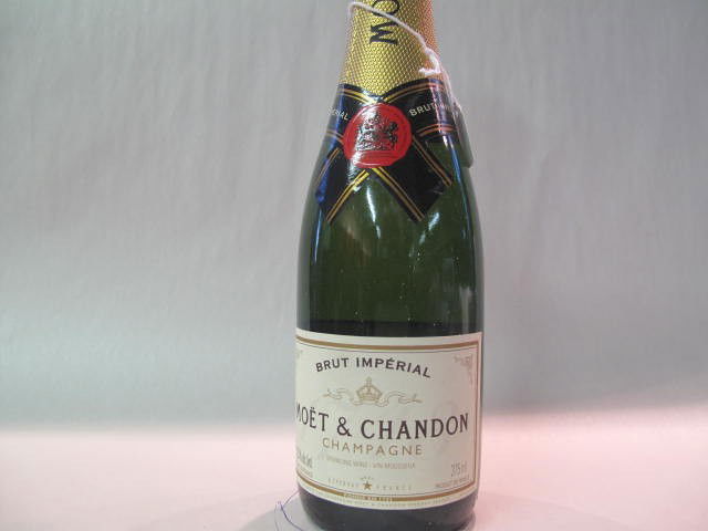 Moet et Chandon, Champagne, 375 ml: This wine bottle will be sold in auction with S.A.Q.approbation. Note: All wine bottles value were upraised $100-$200, even if they are worth more or less. We all start them at $10, because these bott
