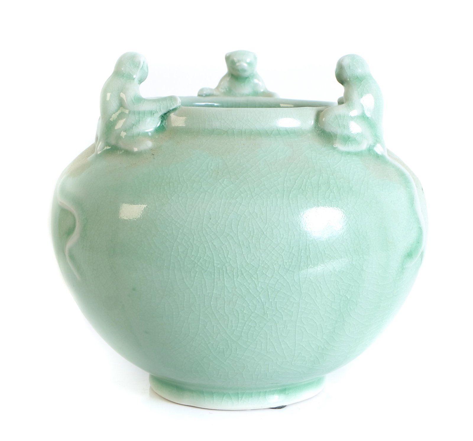 Chinese Celadon Glazed Porcelain Bowl w/Monkeys: Chinese celadon crackle glazed porcelain bowl decorated at the rim with three monkeys. Approx. height