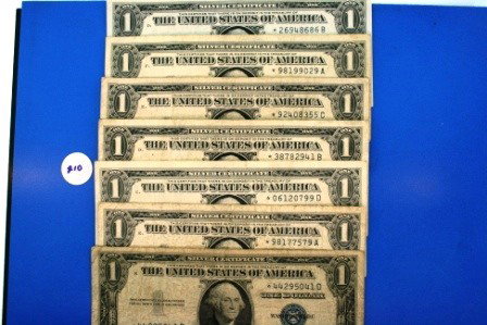 7 piece lot of US 1$ silver Certs (replacement bil: 7 piece lot of US 1$ silver Certs (replacement bills *serial numbers)