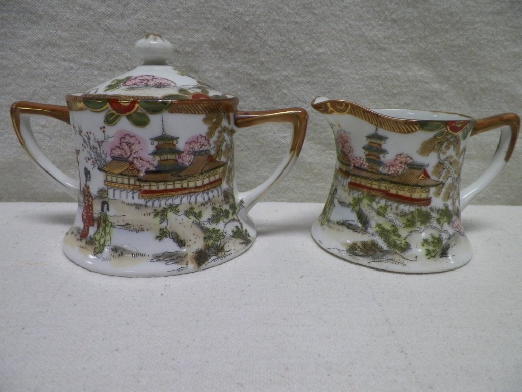 Nippon Creamer & Sugar Marked TN Nippon Asian Design: C 1900. Sugar 4" Tall 6" Handle to Handle. Creamer 3"Tall 4.5" Handle to Handle.