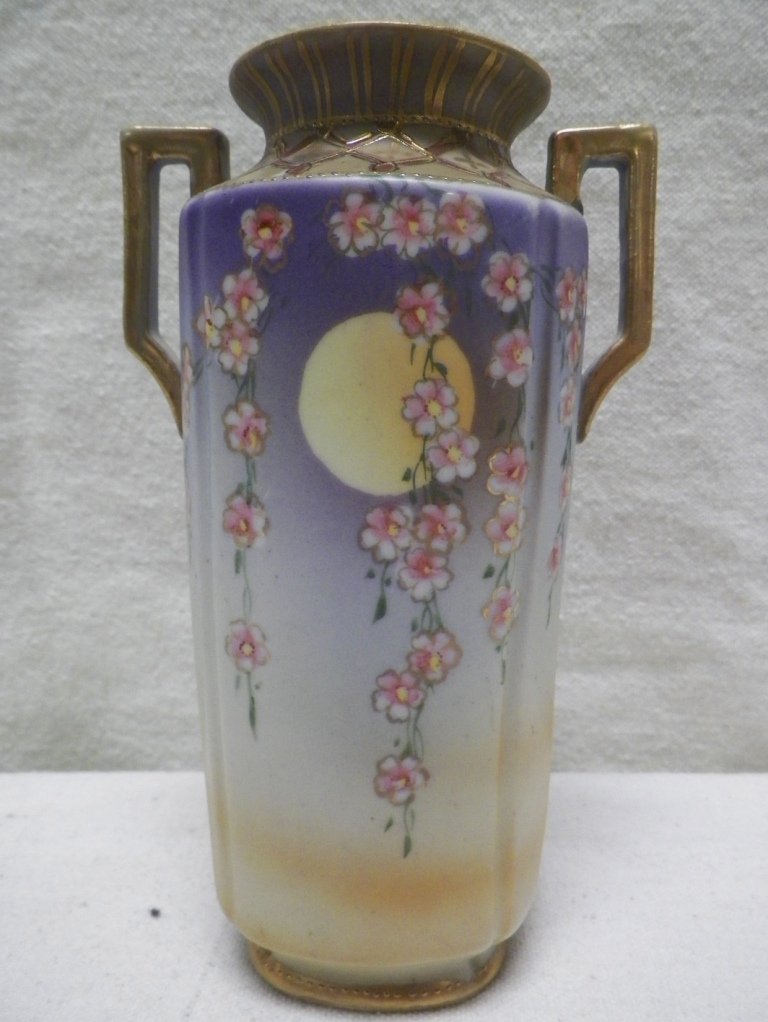 Nippon Vase Hanging Flowers and Gold Trim: C 1910. 7" Tall 4"W Handle to Handle. Light Wear on gold handles.