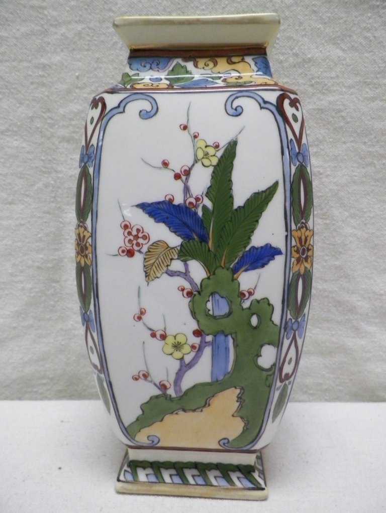 Nippon Vase Morimura Brothers Flowers and Leaves: C 1910. 8.25" Tall 4.25"W. Light wear on gold rim.