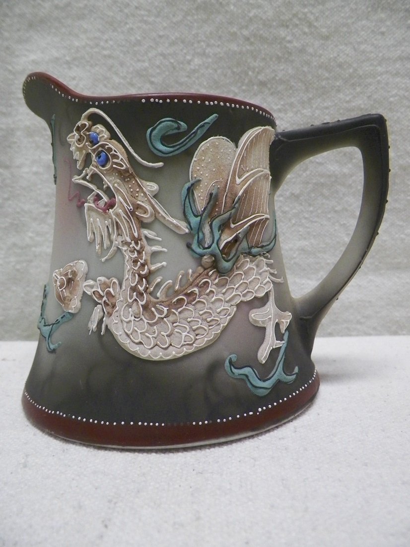 Nippon Moriage Dragon Creamer: C 1910. 3-7/8" Tall 4.75" Handle to Spout. Few missing white spots of Moriage at places.