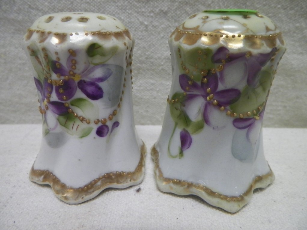 Nippon Moriage Salt & Pepper Violets-Unmarked: C 1910. 3.75" Tall. Light gold wear on tops and crack on one top.