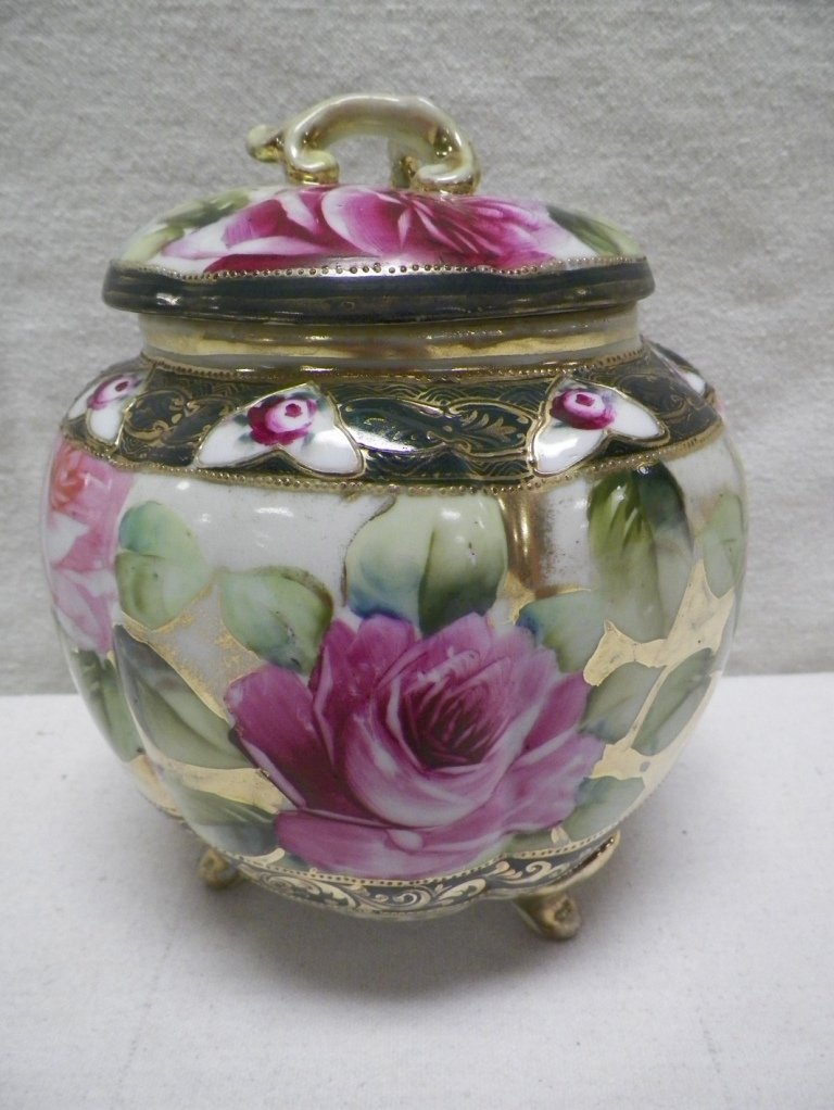 Nippon Cracker Jar Roses-Unmarked: C 1910. 8" Tall 6"W. Light wear on lid handle and feet.