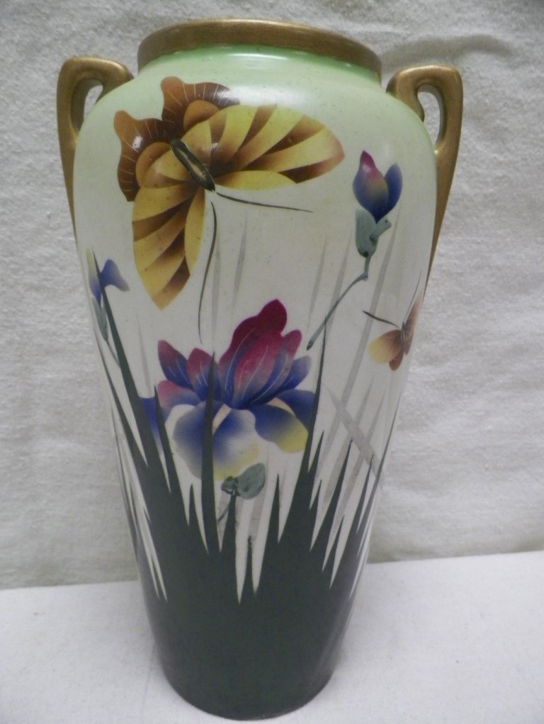 Royal Nippon Vase Iris and Butterfly: C 1910. 12" Tall 7"W Handle to Handle. Small nick on base side. Gold trim may have been repainted.