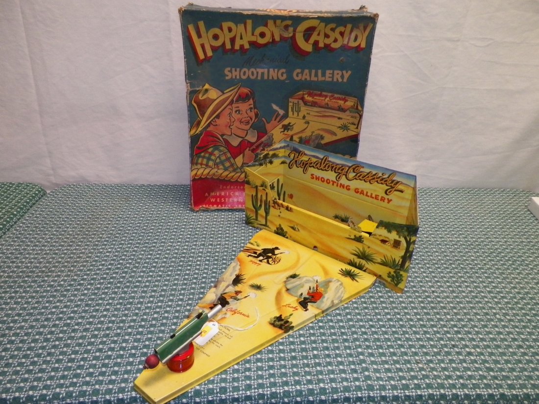 1950s Hopalong Cassidy Shooting Gallery: Box Exhibits Wear (displays nicely); Complete Game w/Original Steel Shooting Balls, Wind-Up Key, Playing Field