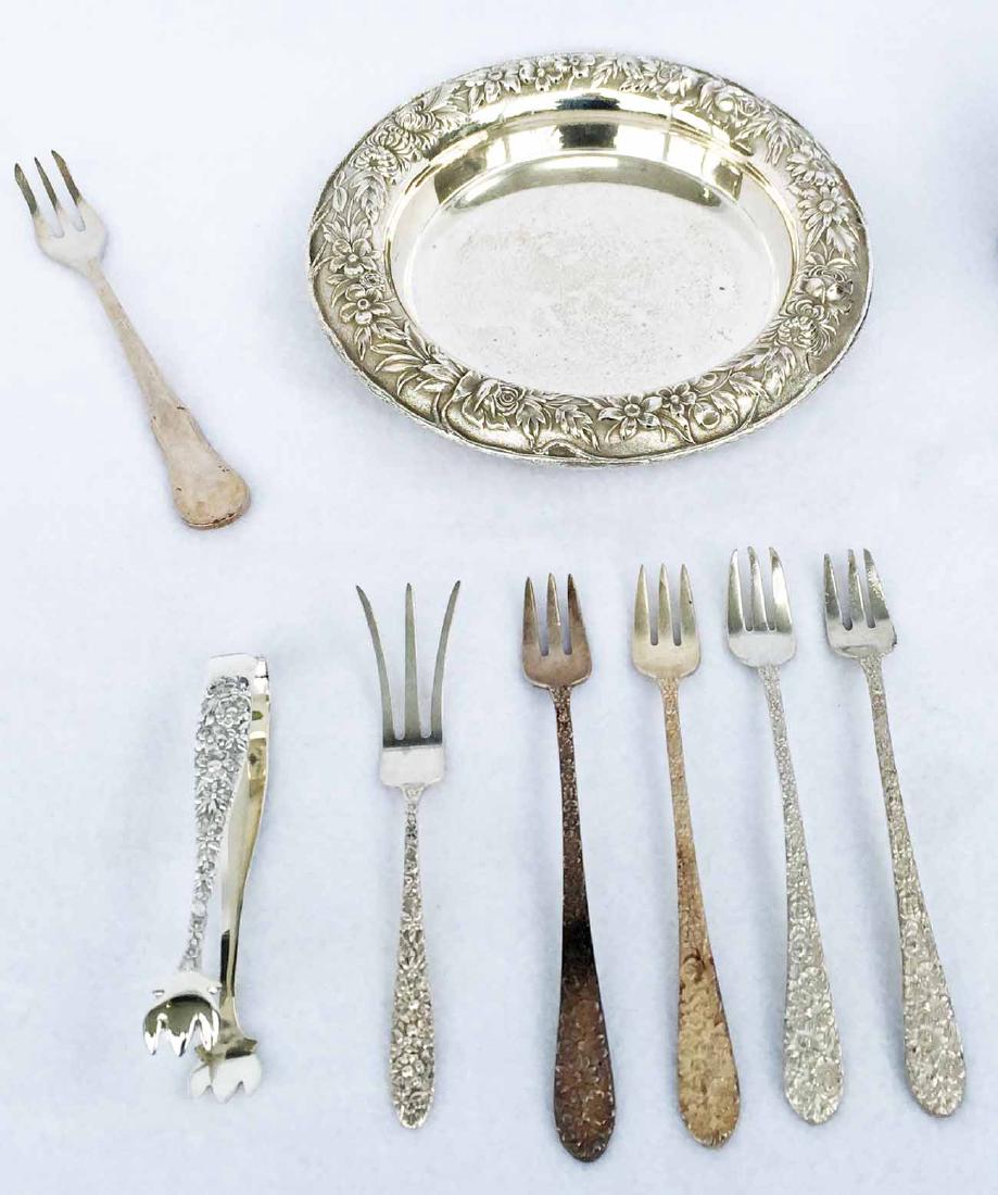 Collection of Sterling Silver: Including: (1) sterling silver plate, S. Kirk & Son, 7"diameter. (1) sterling silver sugar tong. (5) crab forks, (1) lemon fork. Total weight 8.97 ozt.