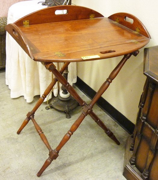 Butler's Tray: (1) 31"h x 34"w. 19th century English. Mahogany with a natural patina. Oval removable tray with fold up sides.