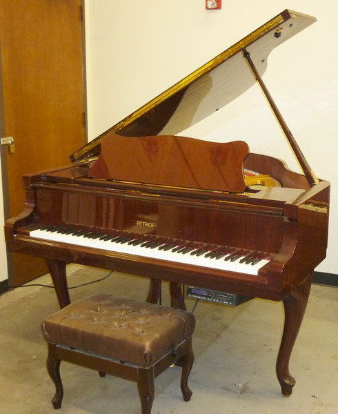 Petrof Baby Grand Player Piano & Bench: (1) 5' 1" Player baby grand piano. Petrof "Czech Republic". Date: 2001. S/N 571755. High gloss mahogany finish with contemporary bench. Includes: piano disk player unit.