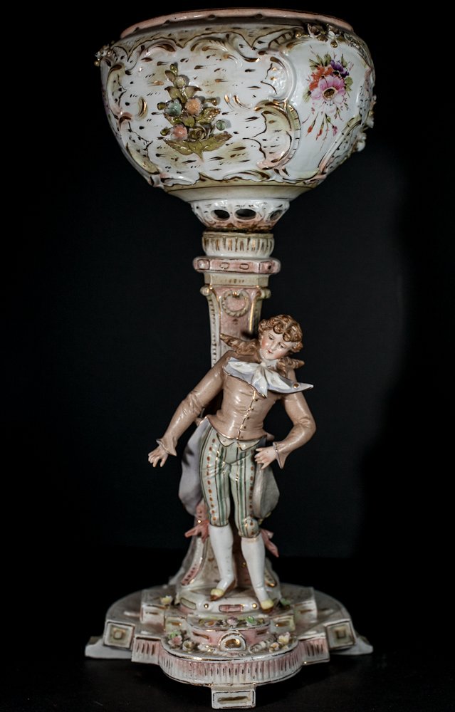 Meissen Style Epergne: (1) 16 3/4" h, 19th century. Standing figurine of man, hand painted appliqué. Damaged & repaired. With minor chips, AS IS. Shipping: USPS or Fedex. $40.00. We will ship internationally for the actual