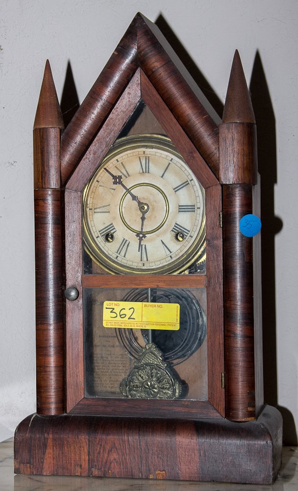 Gilbert Mantle Clock: (1) 21"h. Gilbert Clock Co. Last Quarter of the 19th century, American. Mahogany cathedral style case, eight day spring would movement with time and strike. Shipping: USPS or Fedex. $70.00. We will sh