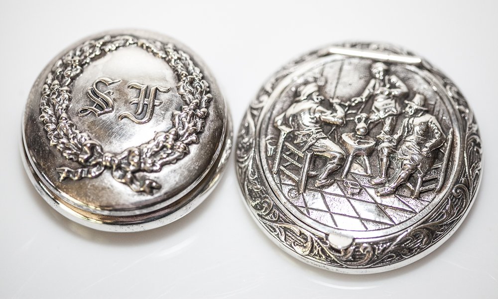 Sterling Silver Compacts: (2) Total. Including: (1) 2"dia., marked: SF, engraving: Hotel St. Frances San Francisco Special Silver Service Design and Mfg. by Reed & Barton Co. New York and (1) 2 1/2"w, with early London touch m