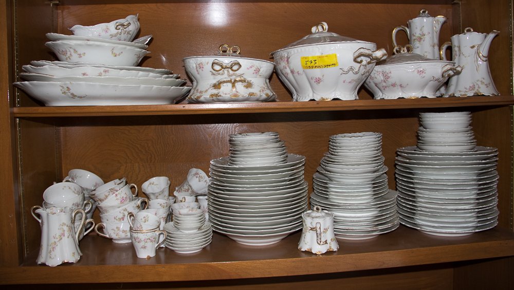 Haviland Limoges & Theodore Haviland Limoges, China Set: (137pc) Porcelain, gold rim and accent with pink flower design. Including: dinner plates, salad plates, cups, saucers, teapot, coffee pot, bowls, serving trays, tea cups and saucers, creamer and sugar