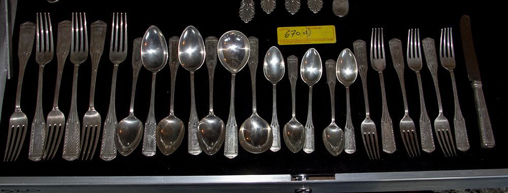 German Silver Flatware by H. Meyen & Co.: 800 mark. Including: (6) 8" spoons, (4) 7 1/4" spoons, (2) 7" soup spoons, (5) 5 3/4" spoons, (6) 6 1/2" forks and (1) table knife with stainless steel blade. Engraved initial: C