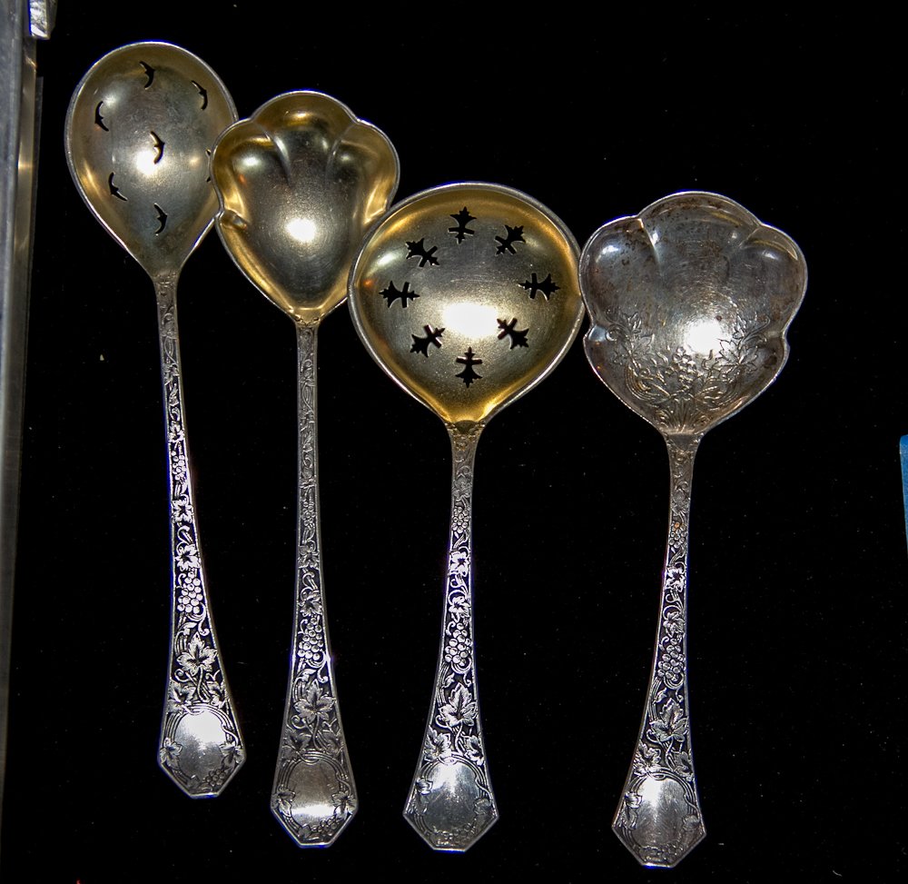 SSNC Sterling Silver Serving Spoons: (4) Total. Including: (2) pierced and (2) seashell shape bowl spoons. Grape leaf design with black backing. Shipping: USPS or Fedex. $20.00. We will ship internationally for the actual shipping cost.