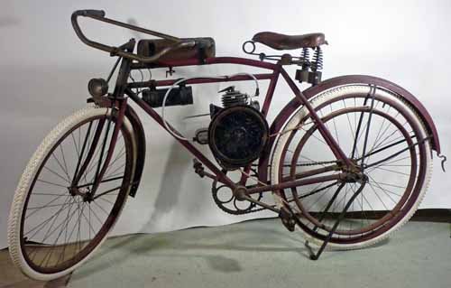 Antique Motorized Hoffman Cycle Bicycle with Evans: (1) Circa 1920, Hoffman Cycle Company Perri. Red frame and white rim. With a 1910 - 1911 Evens Autocycle clip-on motor. Marked: Cyclemotor, 1081 and C 345 00W. Original with new tires. Operable.