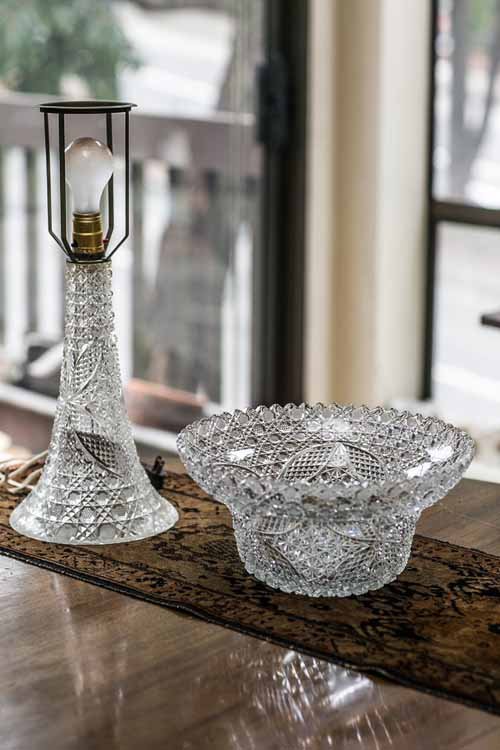 Antique Cut Crystal Table Lamp: (1) 19 1/2"h x 20"dia. Early 20th century. Brilliant cut crystal with daisy & button and variation pattern. Two piece construction with flared flat top shade, 12"dia. Crystal base, and 12 1/2"h flared