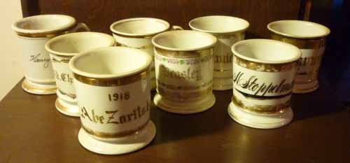 Personalized Antique Shaving Mugs: (11) Total. Ceramic and porcelain. 19th and early 20th century. Including: T & V Limoges France; EPM Germany. (1) marked: C. Weicmsel Company Dallas Texas.