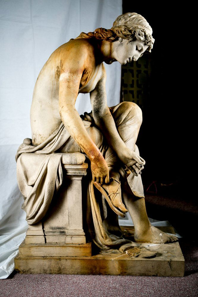 Charlottenburg E. March, 1883 Stone Sculpture: Terracotta Figurine - (1) Total. 46"h, 18"w x 29"d. base. Ernst Paulfoe Dersden 1883 with fondery mark: Charlottenburg E. March S?he Bei Berlin. With artist signature. Subject: seated Classical woman