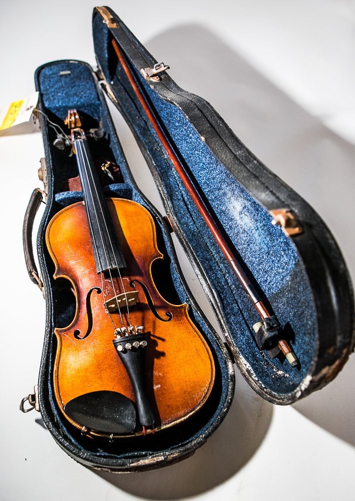 Student Violin Antonius Stradivarius: 3/4 size. Student Violin. Copy of Antonius Stradivarius 1205 Germany - (1) Total. 20 1/2"l overall. With original paper label. With case and Vitali bow. Condition (Fair). Shipping Price: $50