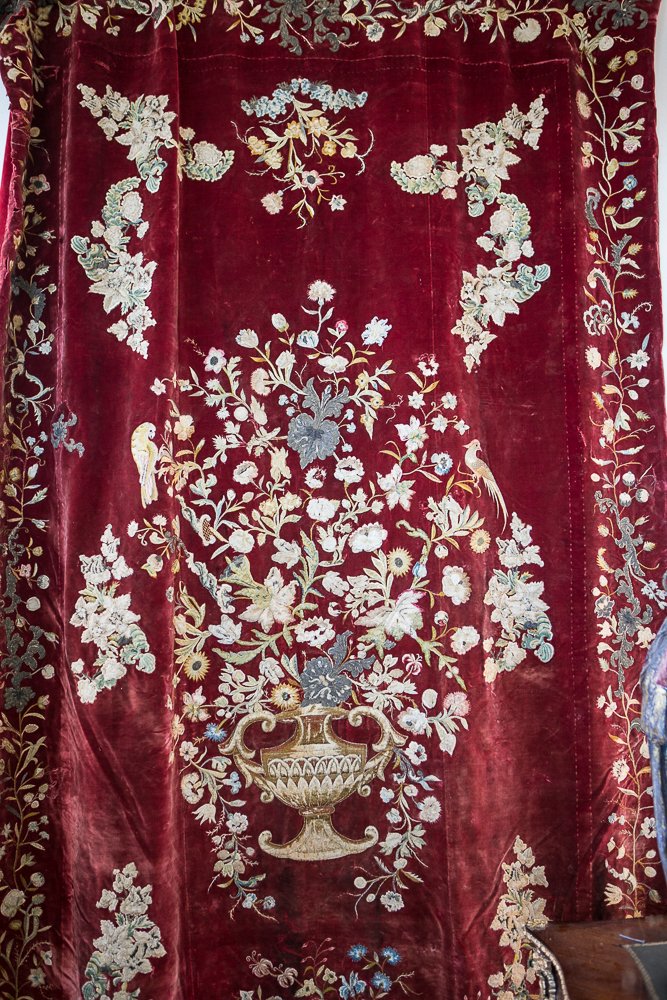 18th / 19th Century Silk and Velvet Needlepoint: Needlepoint Tapestry - (1) Total. 5' 2"x 8' 7". 19th century. Red velvet with urn, floral and bird fine needlepoint design. Damage to top left corner of tapestry, missing some needlepoint. Shipping Pr