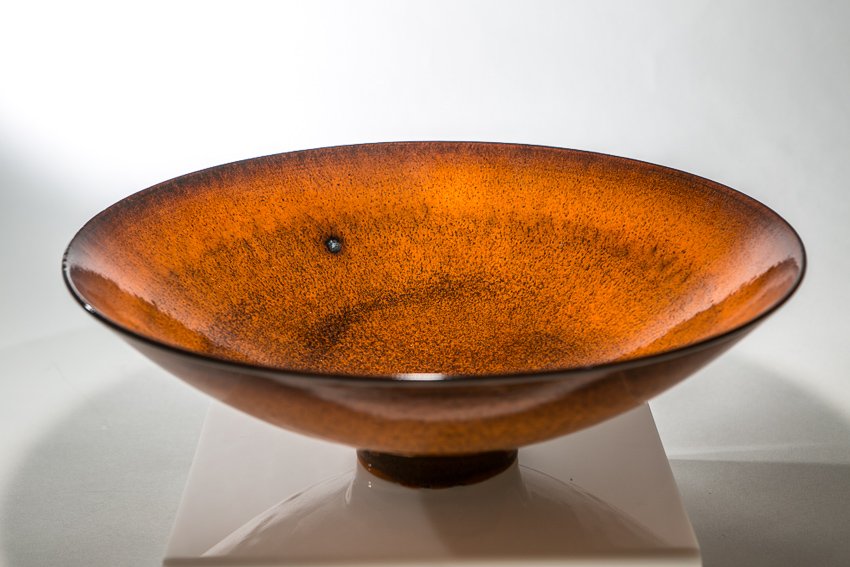 James Lovera Bowl: (1) 14"dia. X 5"h. Artist: James Lovera (1920 - 2015, California). Orange salt glazed finish. Footed base.