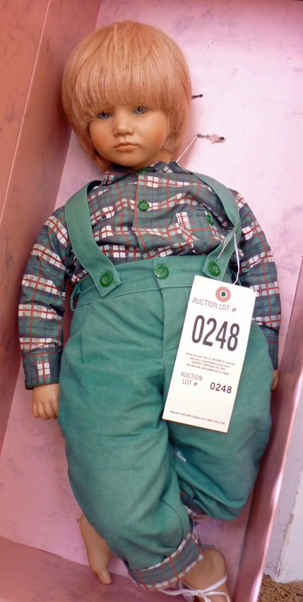 Annette Himstedt Bastian Doll. 3805: (1) Annette Himstedt Bastain Doll. 3805. 26"h. Braided hair, blue eyes, closed mouth. In original box with paperwork. From the Bare Foot Children's Series.