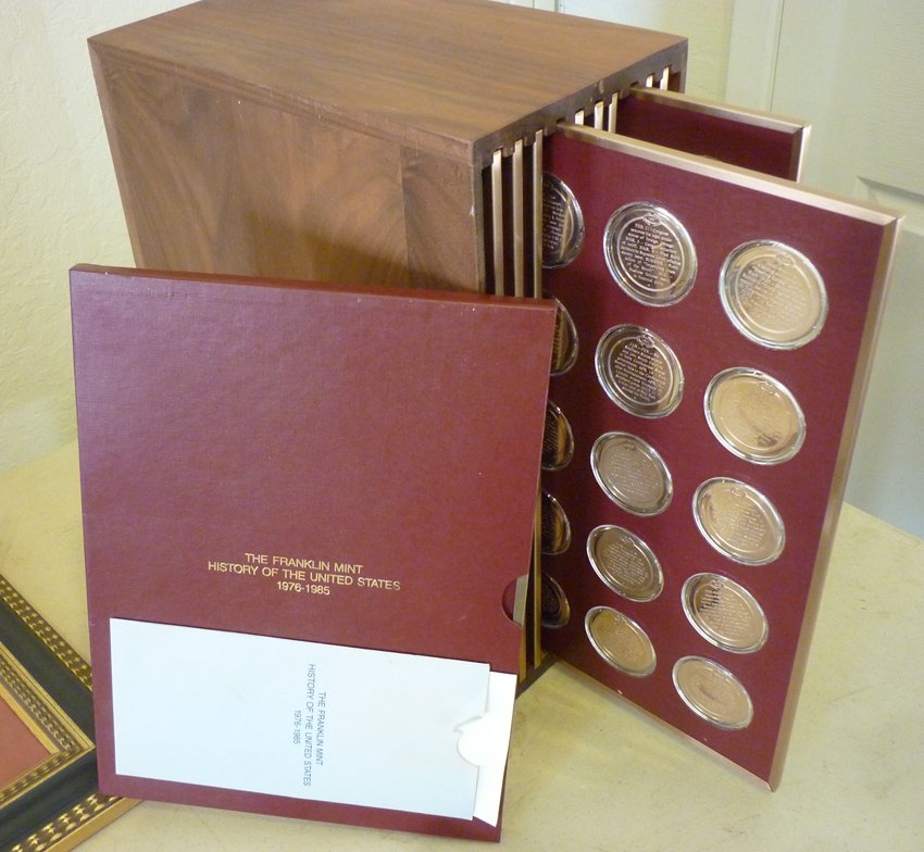 The Franklin Mint History of the United States Bronze: (11) Sheets of bronze medallions.