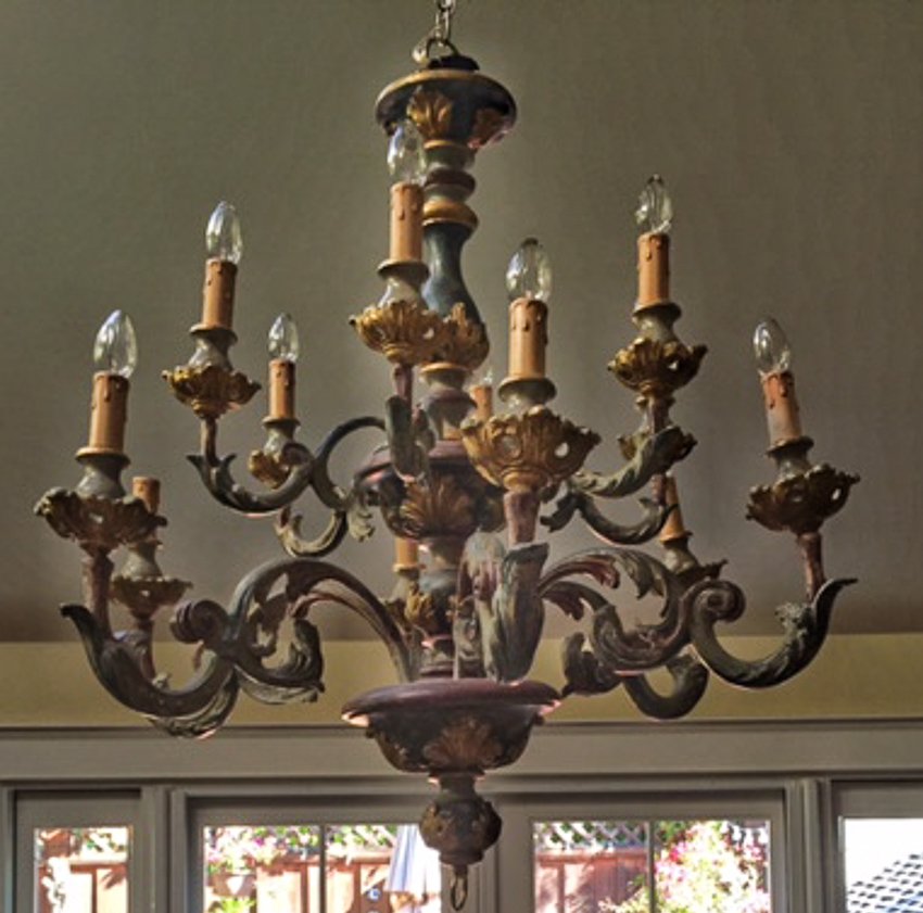 (1) Italian Chandelier: (2) 28"dia. X 31"h. Contemporary. Italian 12 fount. Purchased at Neiman Marcus. Wood body with gilt and green antiqued painted finish. Electrified. (Weight: 25 lbs.).