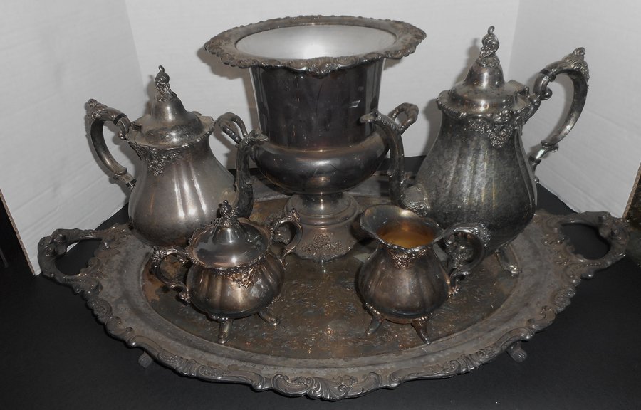 (6pc) Wallace Baroque Tea Set: (6pc) Silver plated. Including: (1) 30" tray, (1) 10 3/4" wine cooler, (1) teapot, (1) coffee pot, (1) sugar, (1) creamer