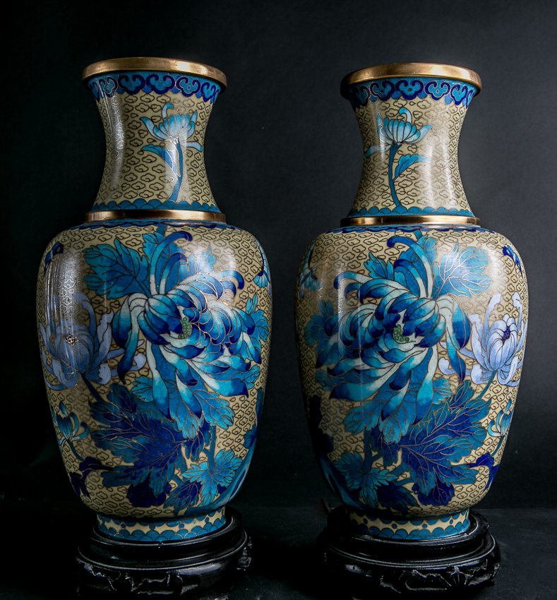 (2) Cloisonne Vases: (2) 10 1/4"h. Blue and lavender floral vase over yellow background. Including ebonized wood stands.