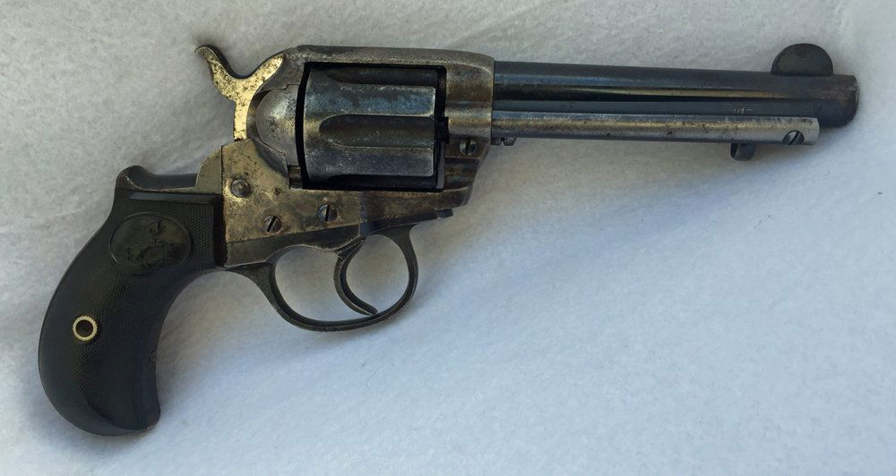 1894 Colt D.A 41 Single Action Revolver: 1894 Colt D.A 41 Single Action Revolver. Six shot, hand eject. Ruminants of blued finish. Black composition stock. S/N 156985