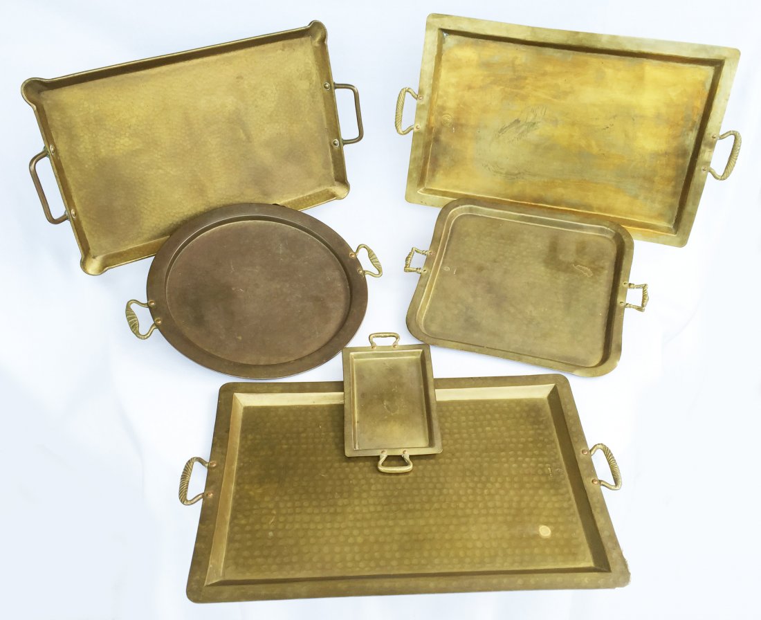(6) 19th Century Russian Brass Trays and English Tray: Hand forged with copper nails and Russian Imperial Warrant double eagle stamp. Including: (1) 11 7/8"w x 20"l, (1) 11 5/8"w x 20 1/2"l , (1) 12 1/8"dia., (1) 4 5/8"w x 8 1/2"l. (1) 11 7/8" x 11 7/8" S