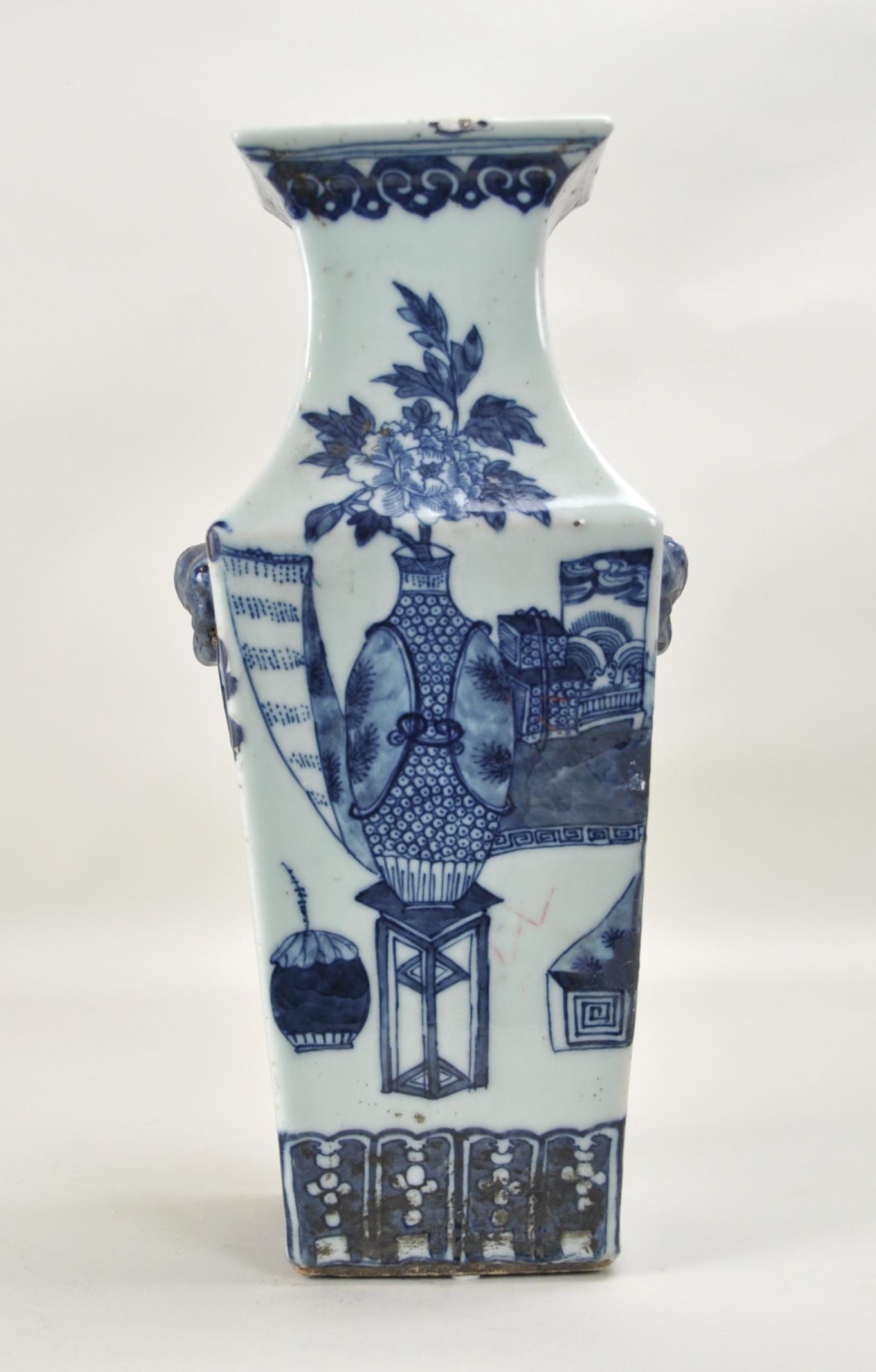 Chinese Square Celadon Vase: Painted in blue flower. It measures 15.25" tall. 19th. C.. Good condition with age wears.