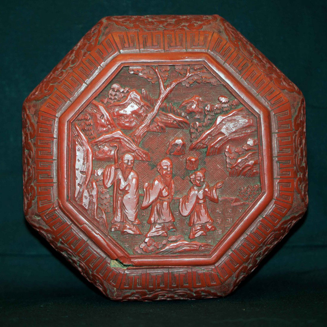 A Chinese Cinnabar Hexagonal Box: 19th. C., 6.26" wide and 3.15" tall. There are some age wears and chips. The shipping cost is $30 plus insurance within the US (exincluding Alaska and Hawaii).